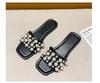 Large size pearl flat bottom sandals women's 2025 summer new Xiaoxiangfeng square head casual outer wear one-word slippers