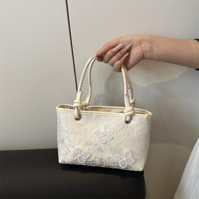 Minimalistische Spitzen-Schmetterlings-Handtasche mit Stickereien für Sommer-Casual-Outfits