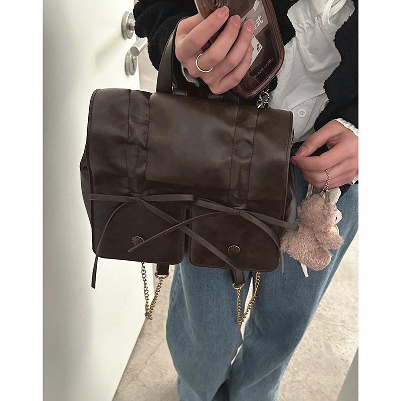 

Ретро высококлассная плиссированная сумка-рюкзак для женщин 2025 новая модная крутая сумка-рюкзак с бантом повседневный школьный рюкзак большой вместимости темно-коричневого