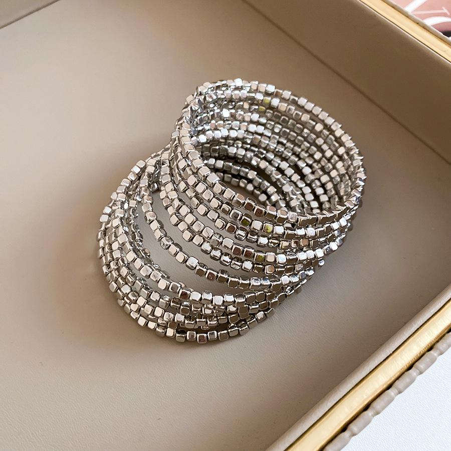 Elegantes mehrschichtiges geometrisches Armband: Luxuriöser, Personalisierter Design- und Kühner Grenzüberschreitender Statement-Schmuck