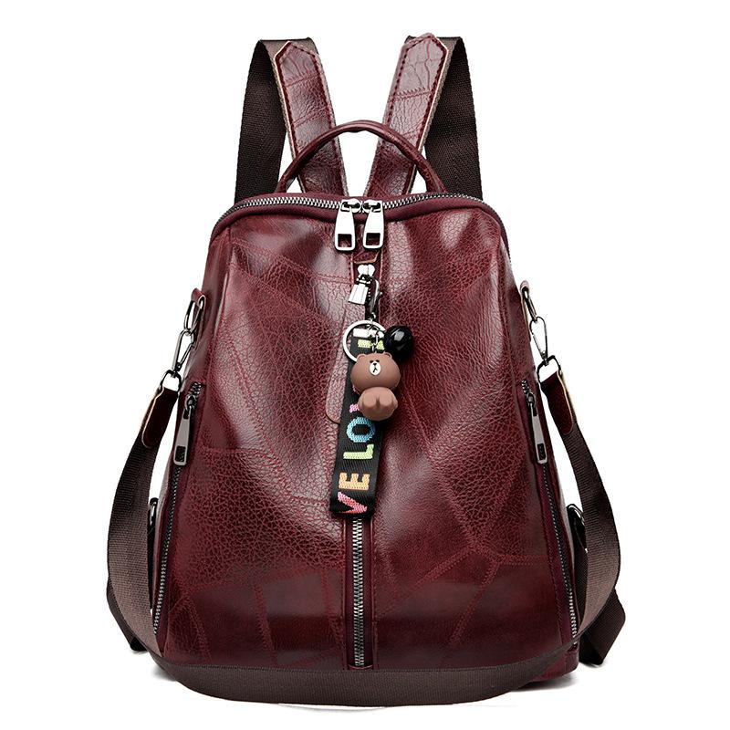 

Модное очарование поражает! Новая корейская версия мягкого кожаного рюкзака с подвеской лидирует в этом тренде. красный