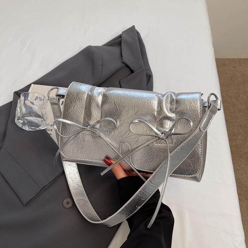 

Korean version pleated drawstring bow bag 2025 new summer new shoulder bag portable fashion bag срібний