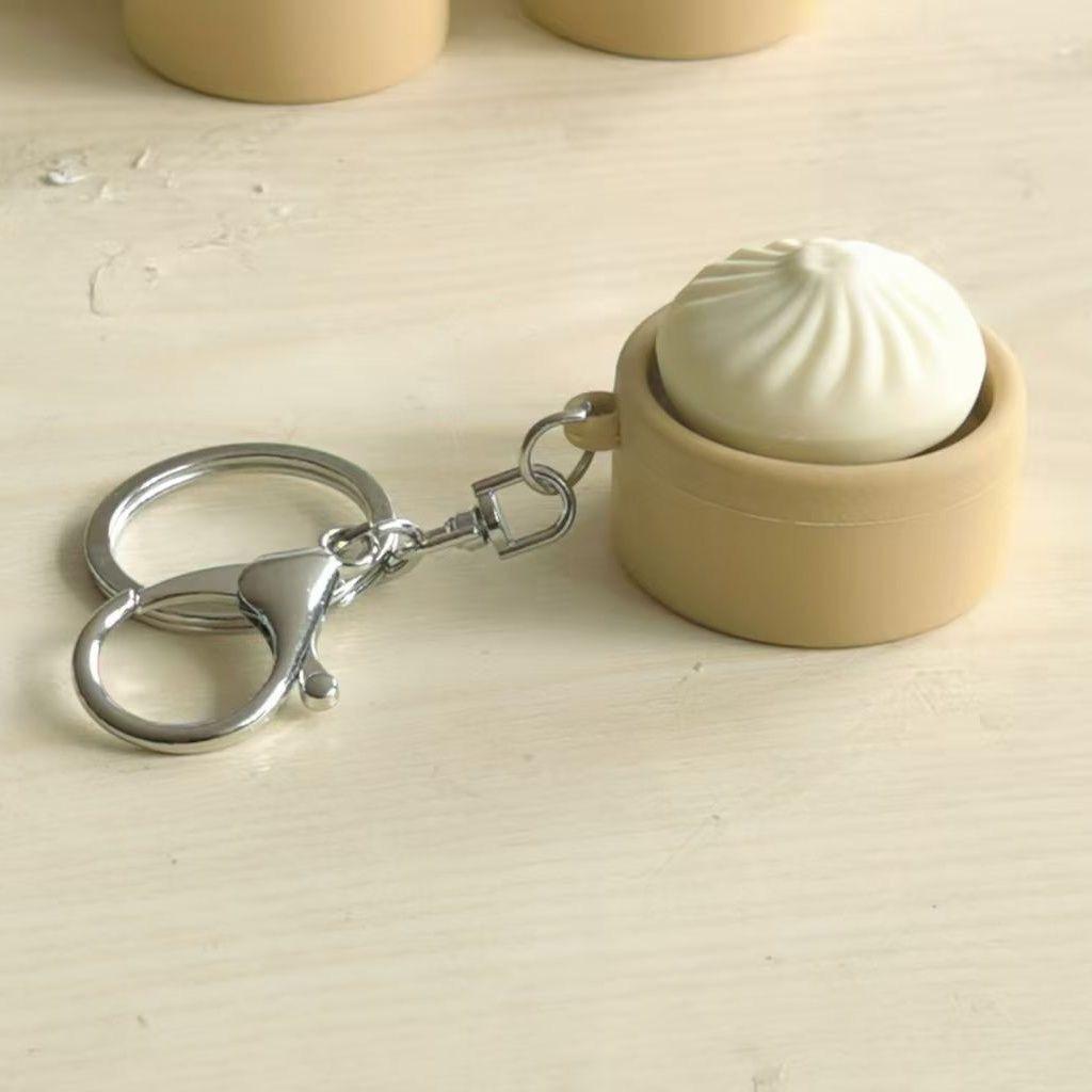 

Cute Baozi Steamer Basket Keychain Decompression Toy Pendant In Stock