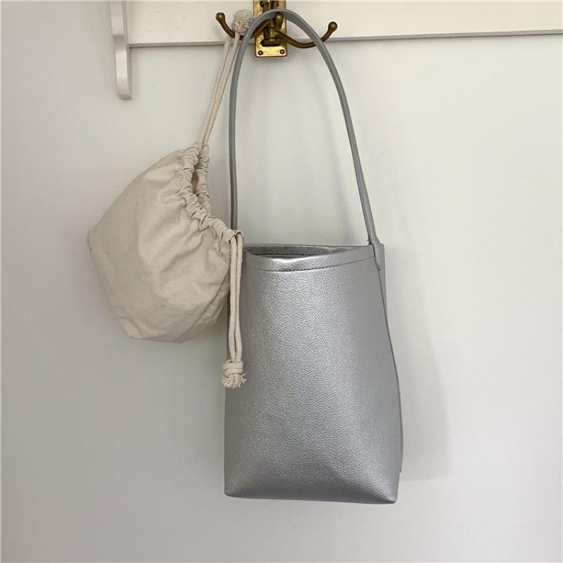 Bucket bag logo shoulder bag large capacity high sense solid color simple leather cylinder mother and child bag