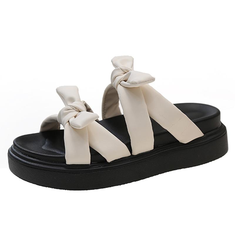 Bow-tie one-word cool slippers women's 2025 summer new Korean version of cute students thick-soled open-toed women's slippers