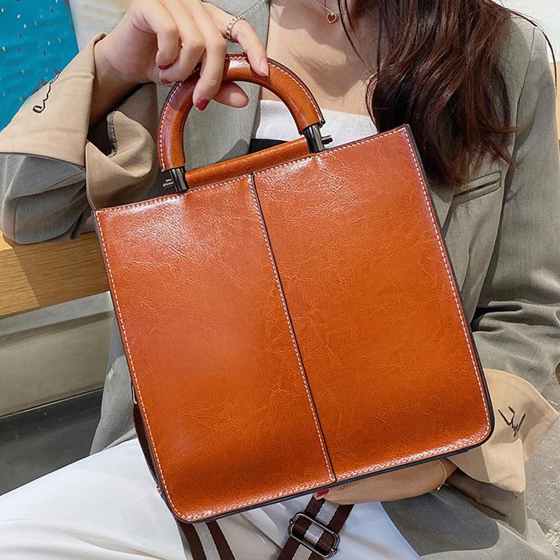 Bolsos de cuero auténtico para mujer, bolso de mano de lujo con cremallera, bolsos de mano de piel de vaca, bolso bandolera de diseñador