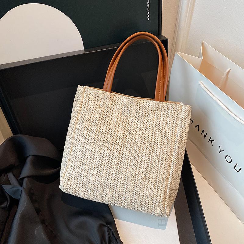 Straw bag women's 2025 new rattan large-capacity bucket bag beach woven contrasting color portable tote bag