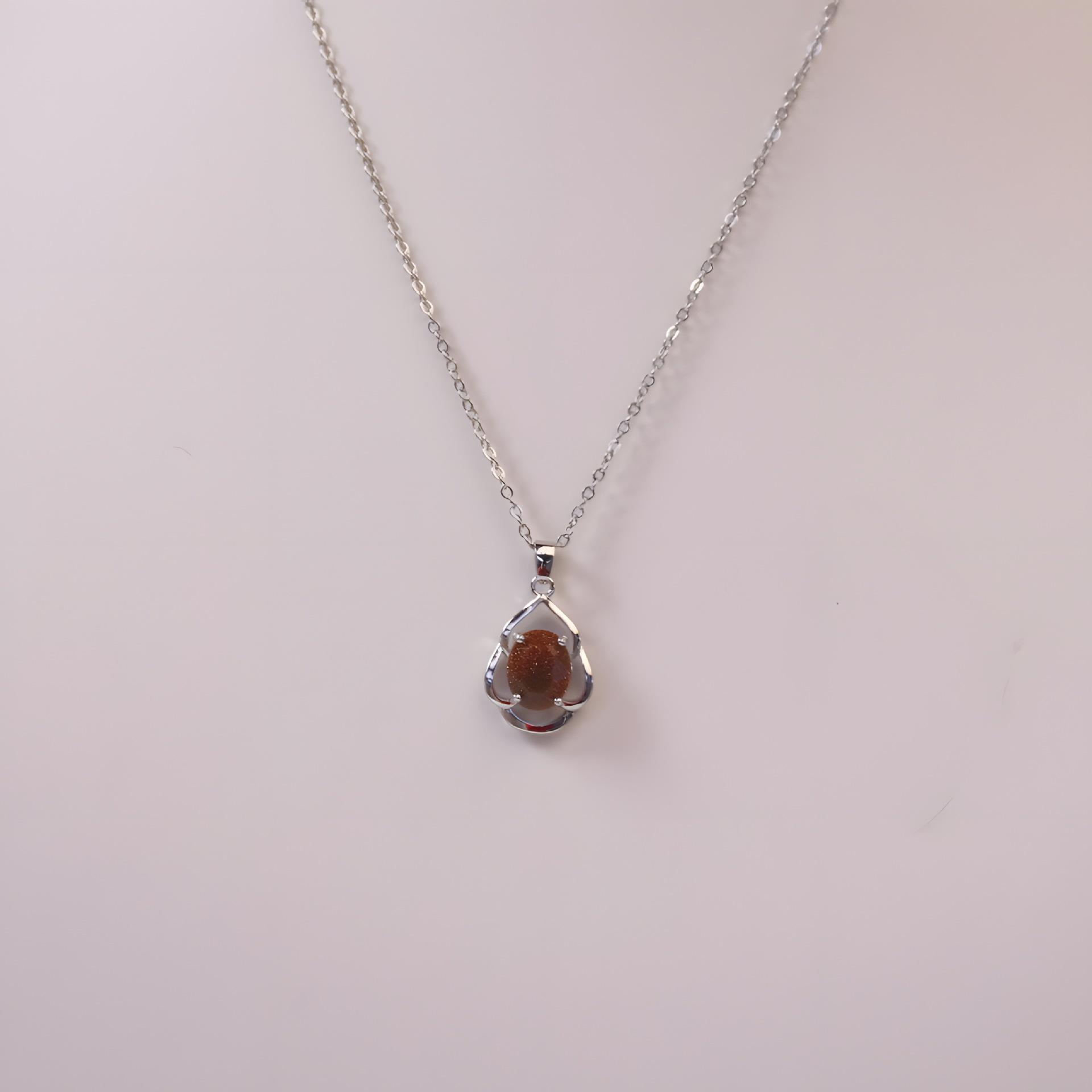 Adjustable Four-Leaf Clover Necklace with Red Zirconia Pendant