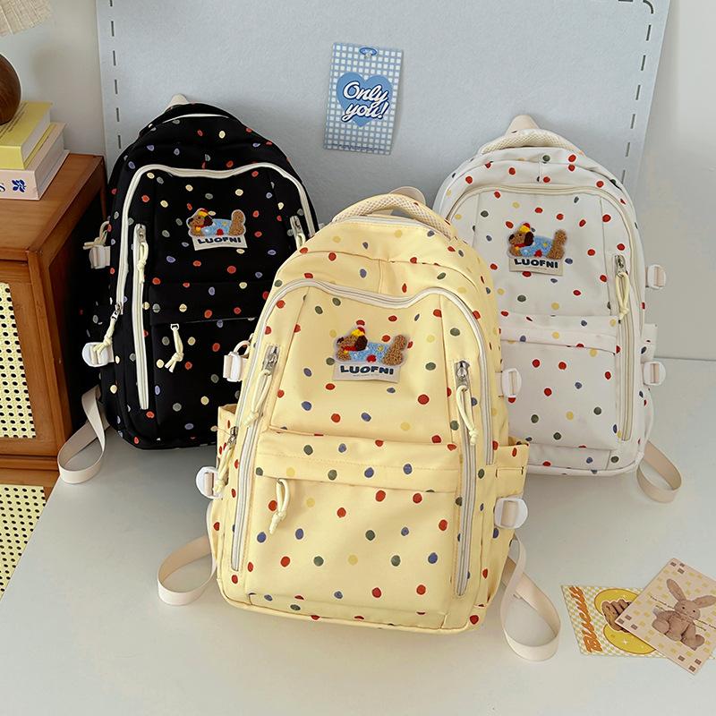 New junior high school backpack female junior high school schoolbag ins niche polka dot cute large-capacity backpack