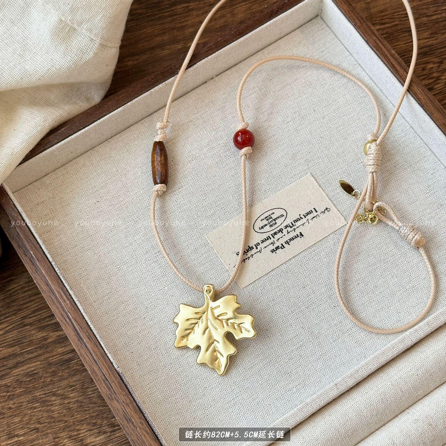 

Камінь тигрове око золотий кленовий лист намисто з намистин жіночий ретро етнічний стиль довга ланцюжок для светра аксесуари на шию