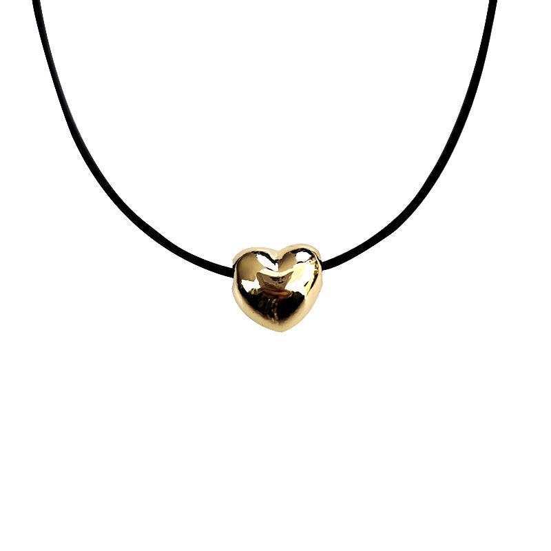 Korean-Style Heart Necklace: Versatile Black Rope with Niche Peach Heart Pendant, Adjustable Sweater Chain for Women.