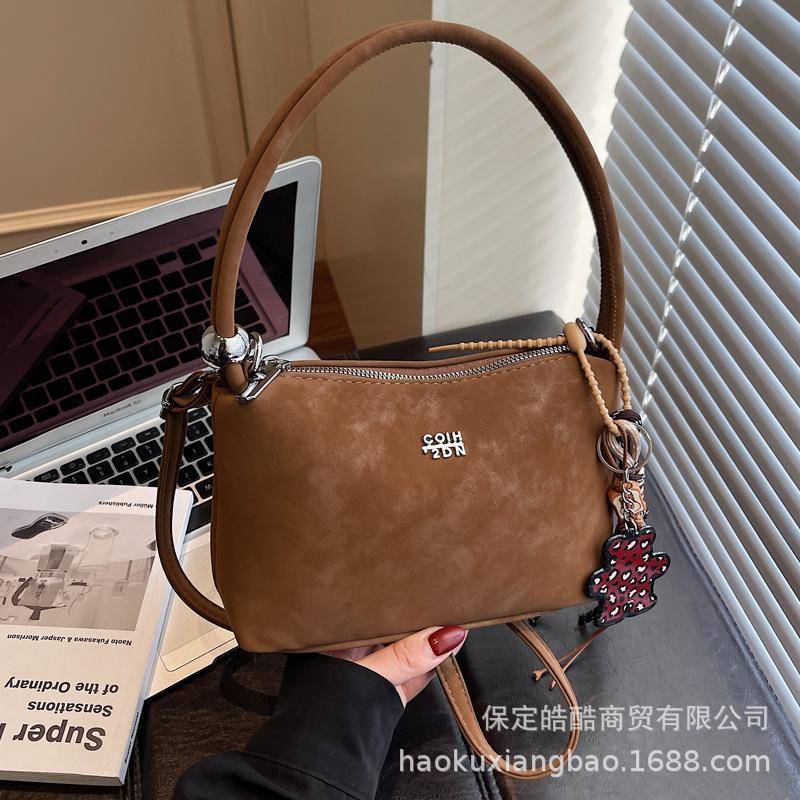Hand bag women's 2025 new trendy light luxury niche high-end shoulder bag popular retro messenger bucket bag