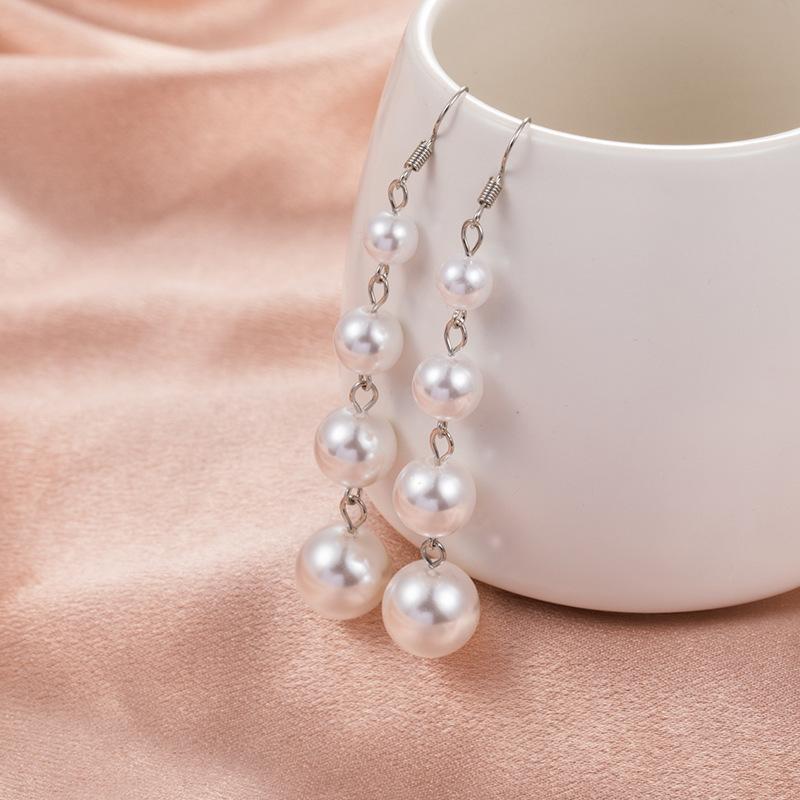 

New earrings, sweet and fresh jewelry, original fringed long pearl earrings, trendy білий