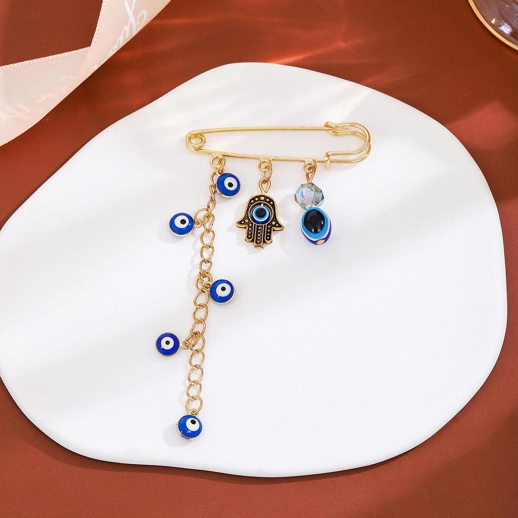 Creative Rhinestone Devil's Eye Tassel Brooch: Women's High-End Blue-Eyes Sweater Pin