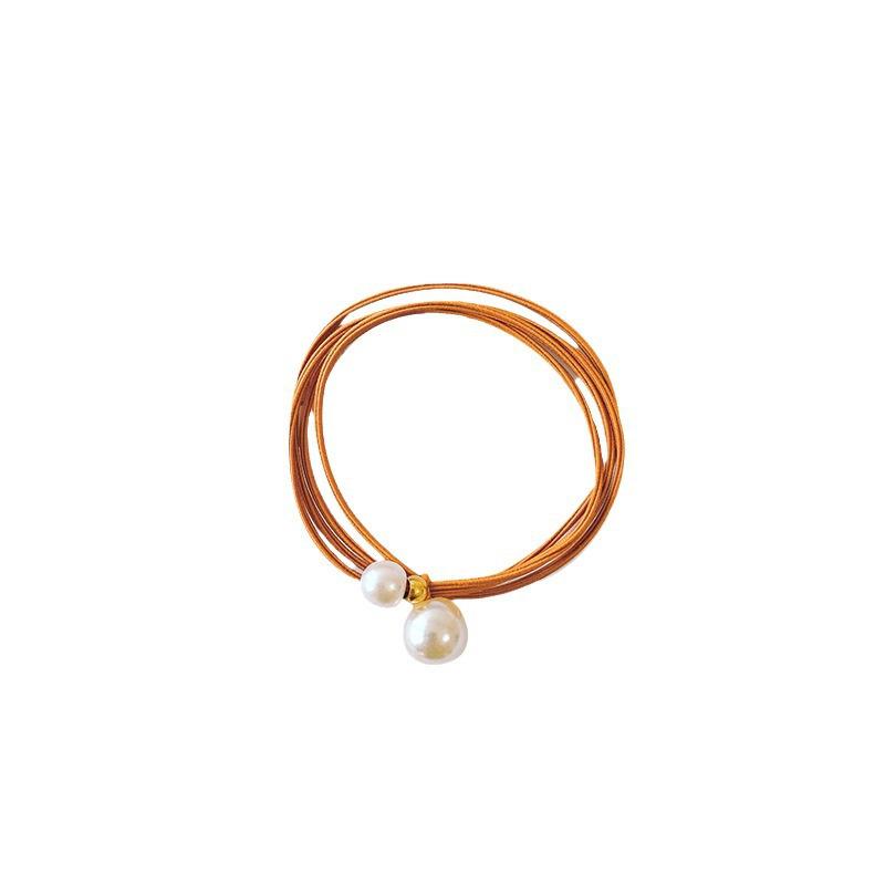 Elegant Korean Pearl Knot Hair Tie - High Elasticity Rubber Band Accessory.