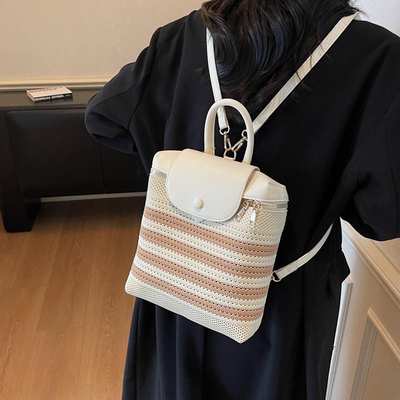 Summer straw bag women's new contrasting color backpack niche hollow woven portable backpack
