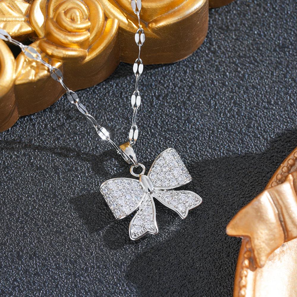 Korean Rhinestone Bow Necklace: Luxurious Zirconia Copper Pendant, Versatile Butterfly Clavicle Chain for Women