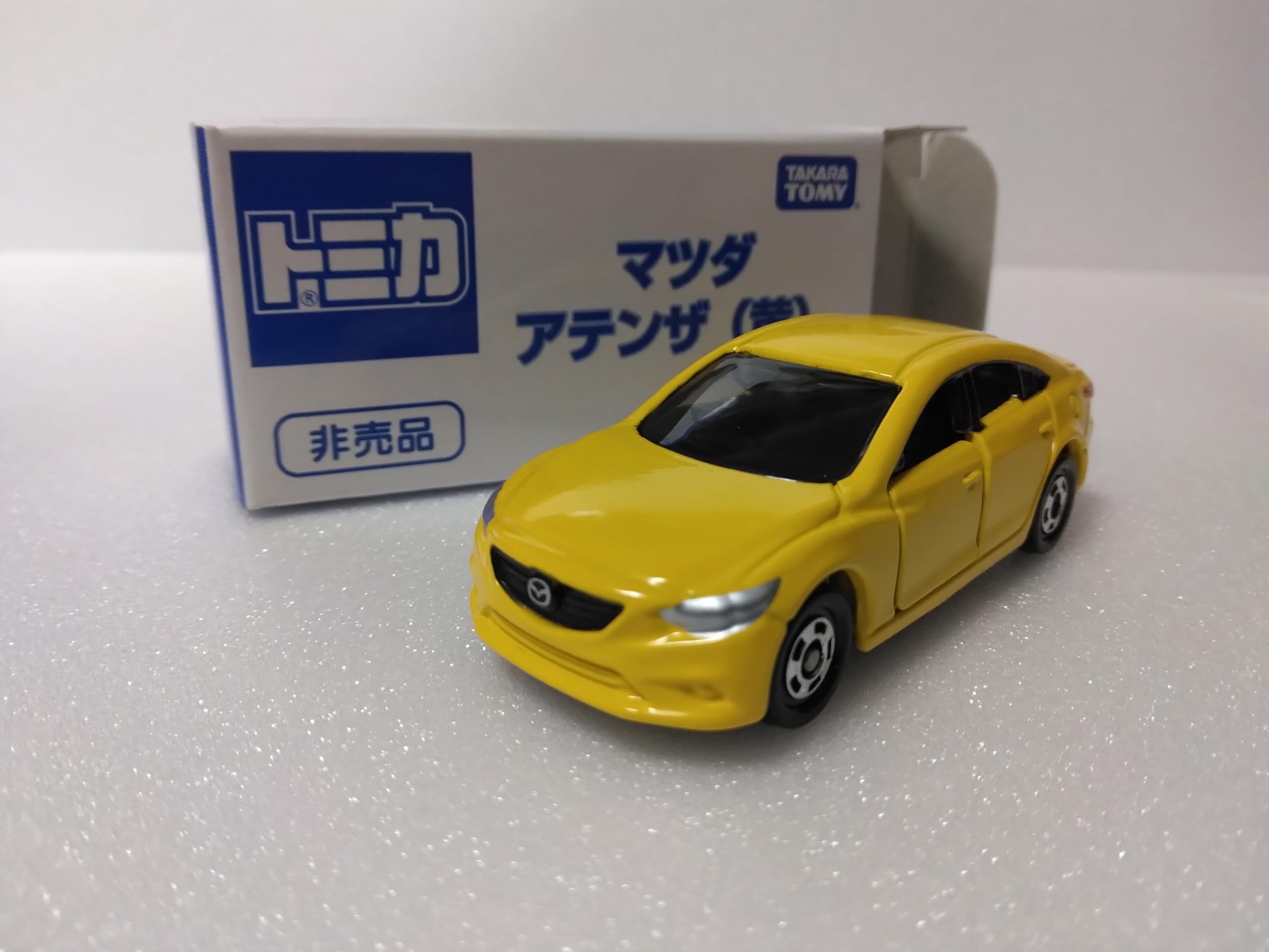 

Tomica не продается. Микроавтобус Mazda Atenza производства Вьетнам, желтый, жёлтый