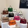 Simple Solid Color Women's Shoulder Bag, New Messenger Bag with Pendant, Women's High-end Handbag.