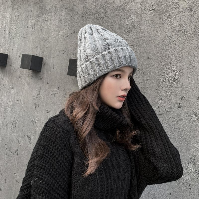 Classic versatile hat women's autumn and winter tide warm thickened ear protector winter women's foreign style knitted wool hat