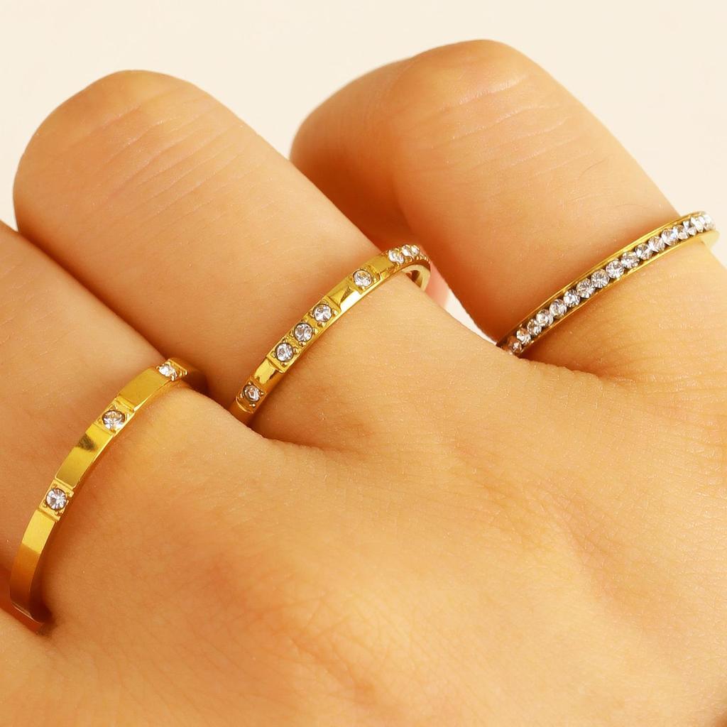 Gold-Plated Diamond-Inlaid Stainless Steel Cross Ring Set: Three-Piece Light Luxury Design with Single Row Stackable Flower Rings.