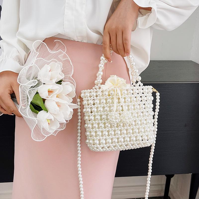 Spring beaded retro fashion sweet pearl hand strap personality trend shoulder personality messenger women's bag