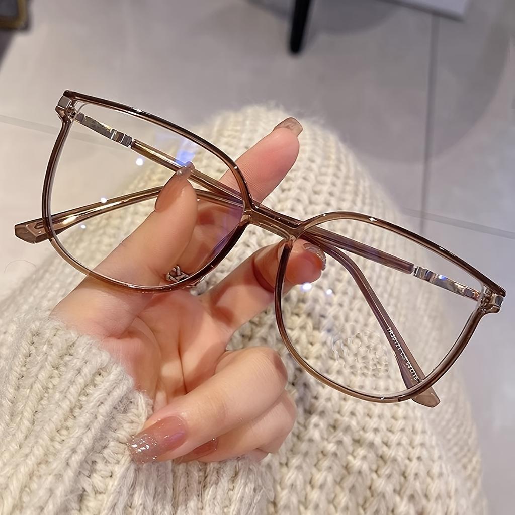 One pair of Women's shiny retro cat-eye glasses with stunning transparent lenses, suitable for all occasions