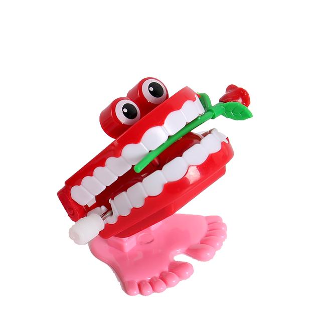 1pcs Clockwork Toy Upper Chain Jumping Tooth Toy Children Jump Teeth Running Clockwork Spring Wind Up Toy