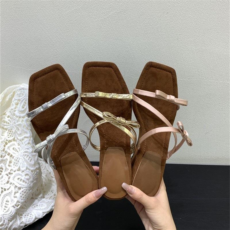 French beautiful bow thick-soled cool slippers women's fashion 2025 summer with skirt one-word wedge slippers