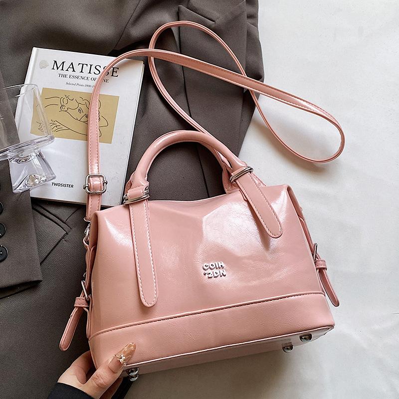 

Корейская ретро простая сумка-подушка из мягкой кожи, портативная, оптовая, взрывная, нишевая для отдыха, для通勤, с передовым чувством, сумка-мессенджер для женщин