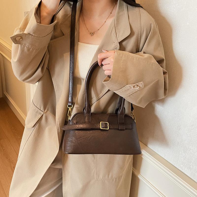 

Fashion commuter autumn new simple temperament casual shoulder bag women s niche large-capacity bag темно-коричневого