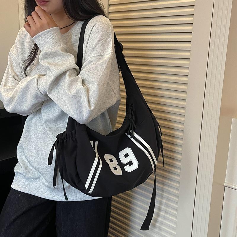 Fashionable and Unique Striped Bag for Holding Dumplings, A Casual Crossbody Bag with An Angle-hung Design At The Armpit.