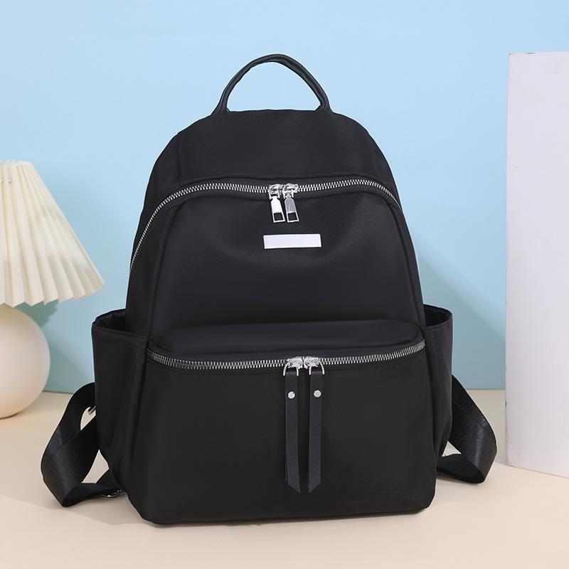 Schooltas Mode Casual Nieuwe Nylon Rugzak Lichtgewicht Grote Capaciteit Veelzijdige Mode Tas voor Uitgaan Reizen