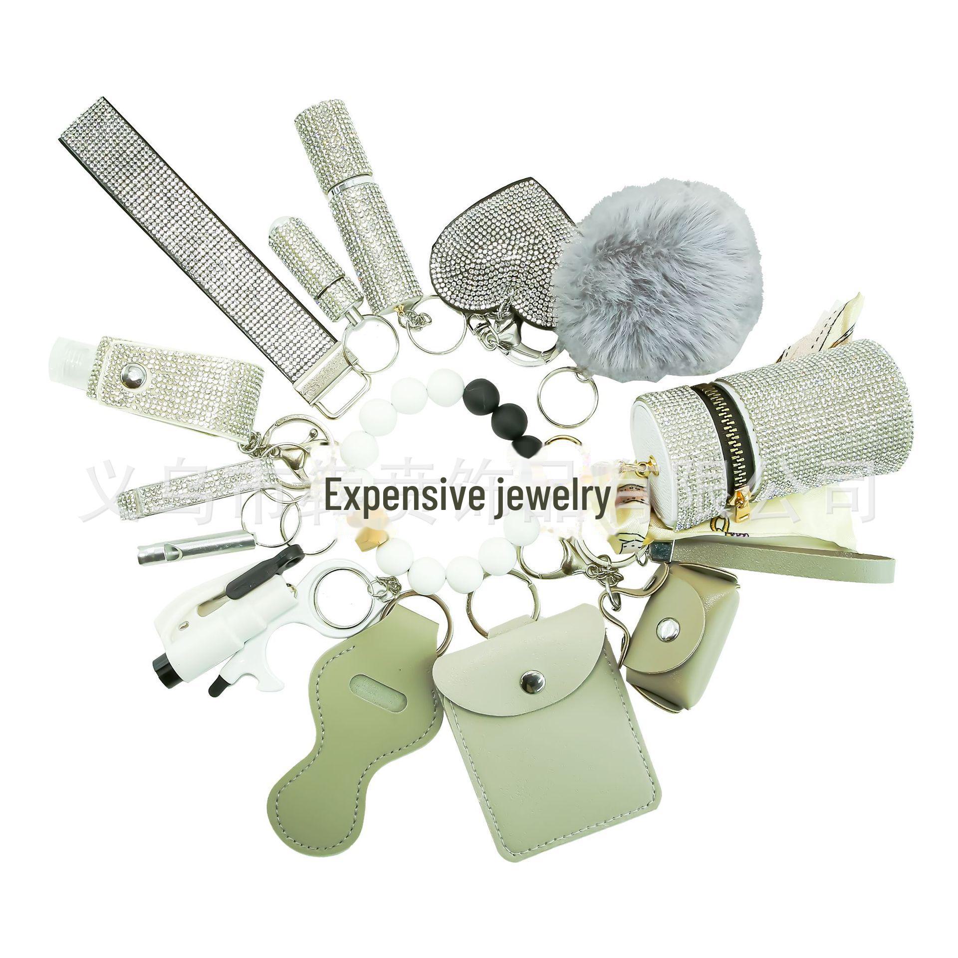 

Набор из 15 портативных брелоков с бриллиантами – Стильная коллекция аксессуаров серый