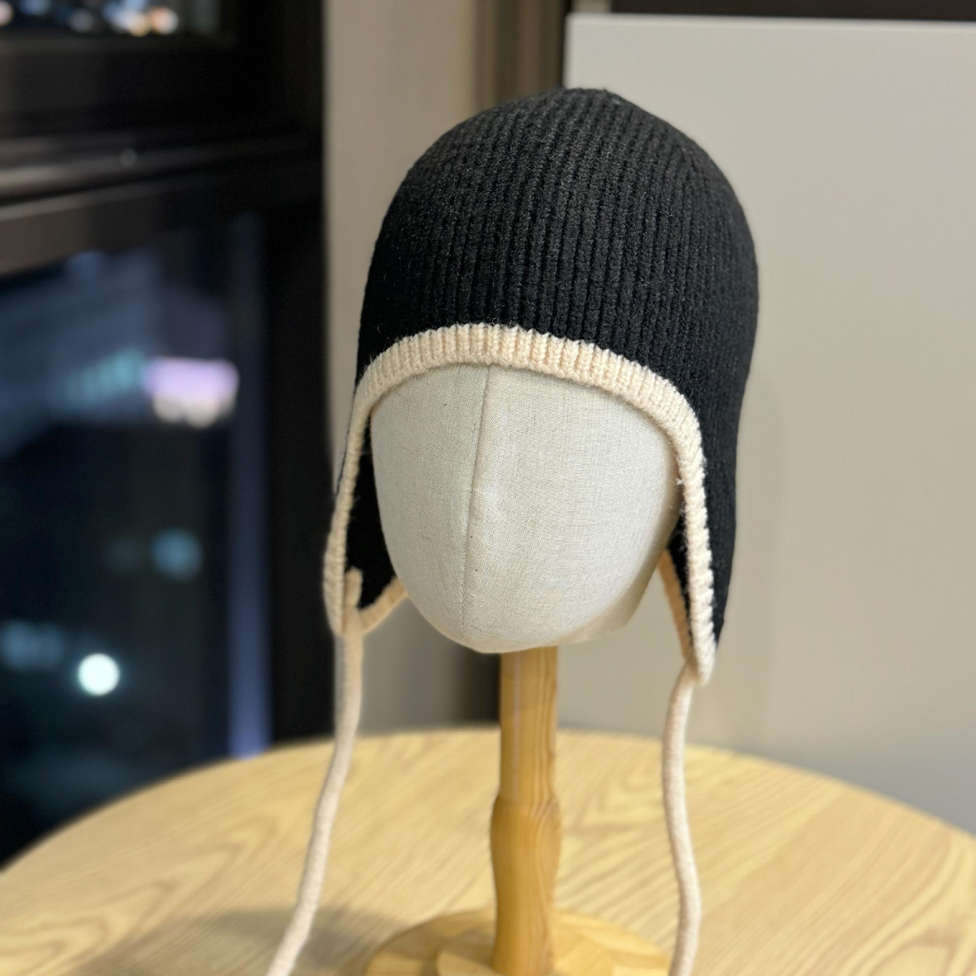 

Solid color knitted hat for women, fashionable, simple, casual, versatile, warm, ear-protecting, windproof, with ties, suitable for autumn and winter Adult54-60Average Size чёрный