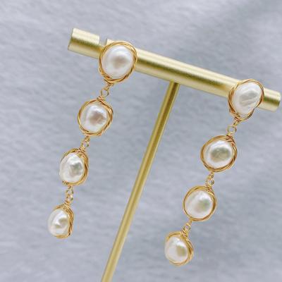 "Natural Baroque Pearl Long Tassel Earrings for Women: Simple, Elegant, and Unique"
