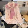Chemise à manches longues pour femme avec rayures 3D et col polo pour un look décontracté de printemps