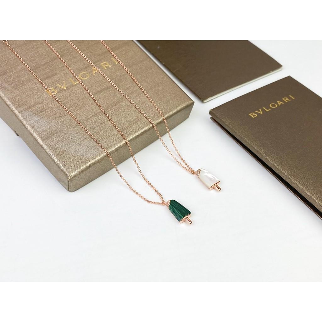 Eis am Stiel, Eiscreme-Halsketten und mein Lieblings-Pfau aus weißem Perlmutt. High-End-Individualisierung, asiatische Goldgalvanisierung