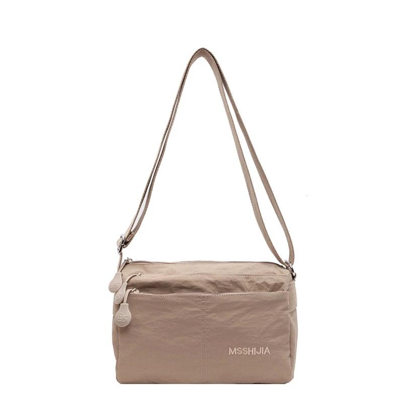 

Casual Soft Nyl Shoulder Bags Large Capacity Sewing Thread 2026 Versatile Handbags for Women Zipper Solid Color хаки