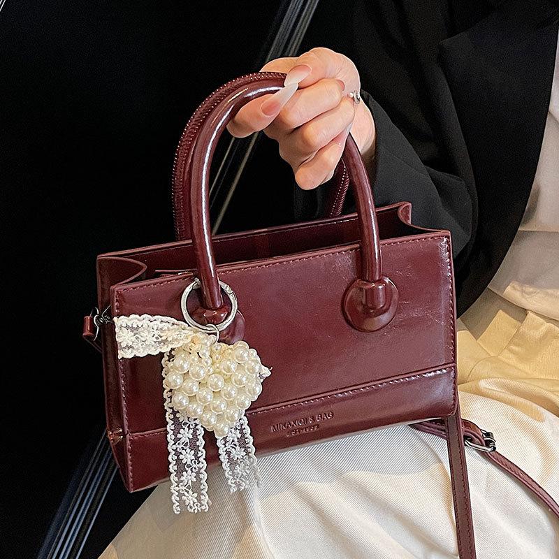 Wholesale Popular Niche Simple Temperament High Sense Portable Small Square Bag Women's Fashion Versatile Work Commuter Messenger Bag