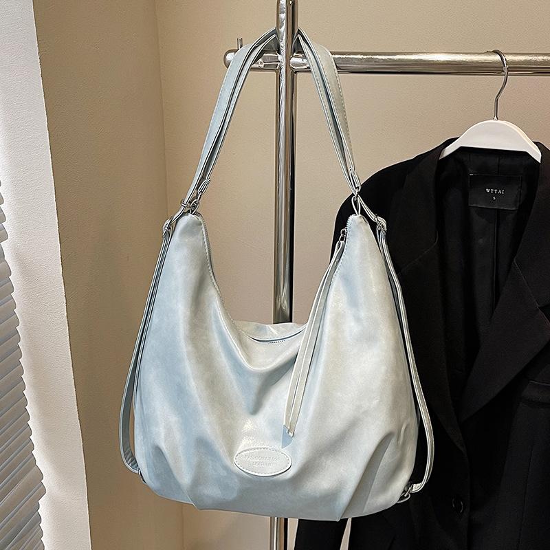 

Весенне-летняя новая нишевая повседневная сумка-рюкзак из мягкой кожи с несколькими отделениями на спине, женская, для студентов, для поездок на занятия, большая вместительная сумка-тоут