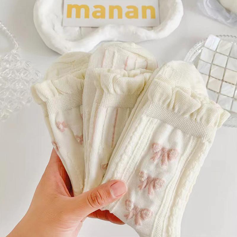 Chaussettes blanches simples, polyvalentes, jolies, nœuds papillon, petites fleurs, chaussettes tube moyennes pour femmes, Kawaii Harajuku Jk Lolita, chaussettes en coton pour filles