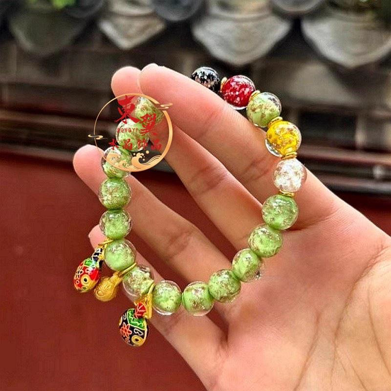 Luminous Golden Beast Luck Bead Women s Bracelet with Gold Foil Scenic Spot Porcelain.