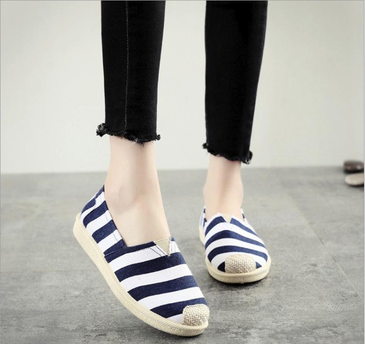 New fashion canvas shoes female student flat white shoes Korean version casual fisherman shoes one pedal lazy shoes