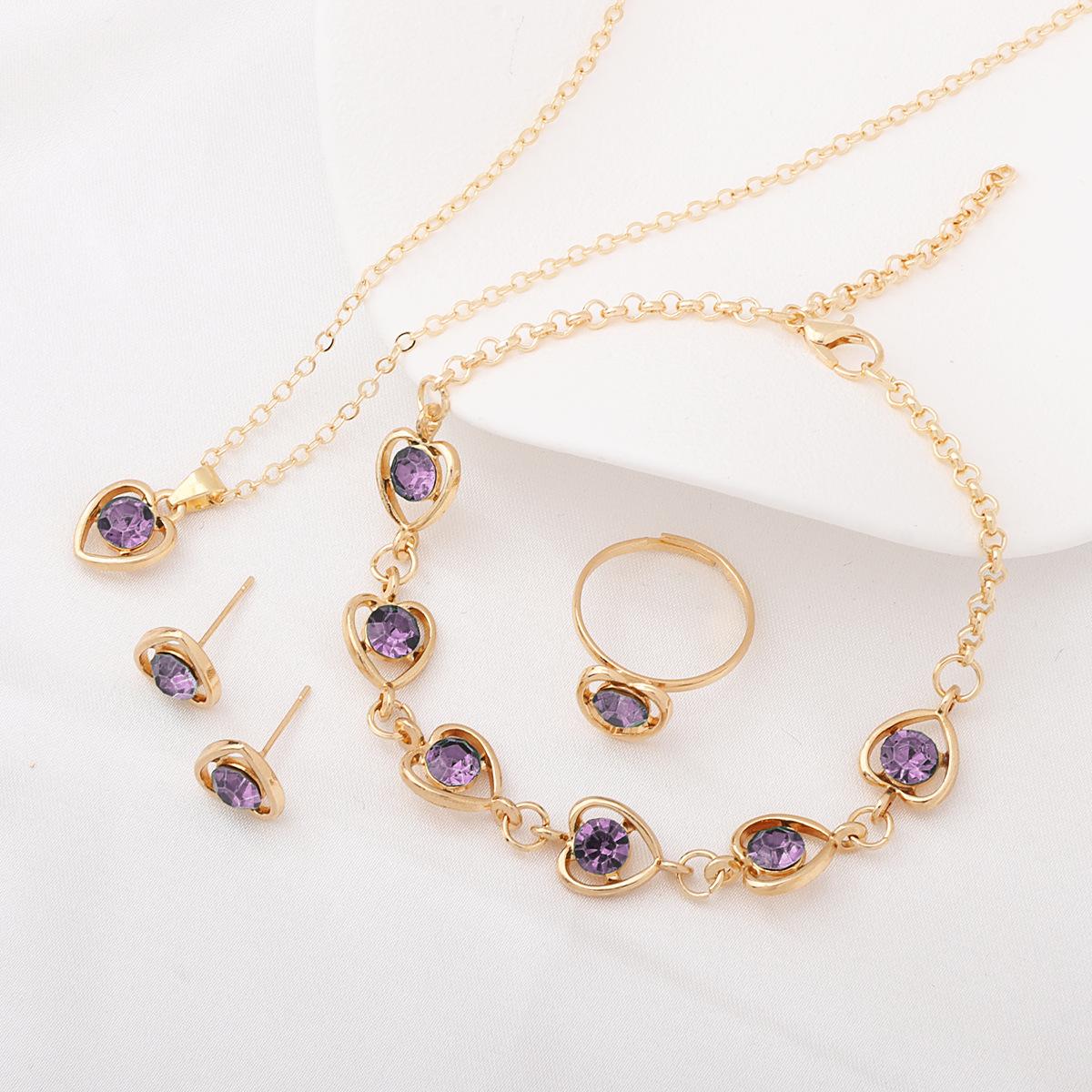 

Crystal Heart Jewelry Set (Peach Heart Necklace, Earrings, Ring, Bracelet) One Size фіолетовий