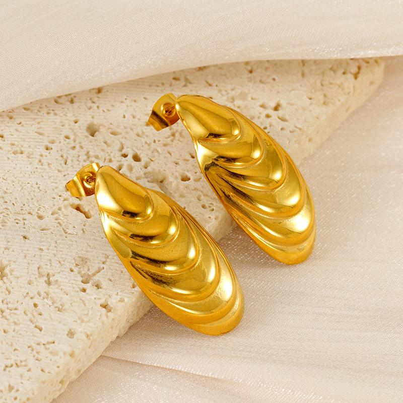 

Trendy Luxe Metal Wave Shell Earrings: Unique European-American Design