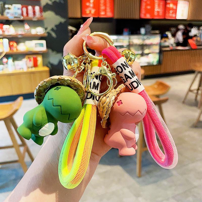 Adorable Cartoon Dinosaur Keychain In Eye-catching Colors Ideal For All Occasions