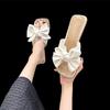 One-word sandals seaside vacation beach shoes women's summer wear 2025 new skirt fairy style bow slippers