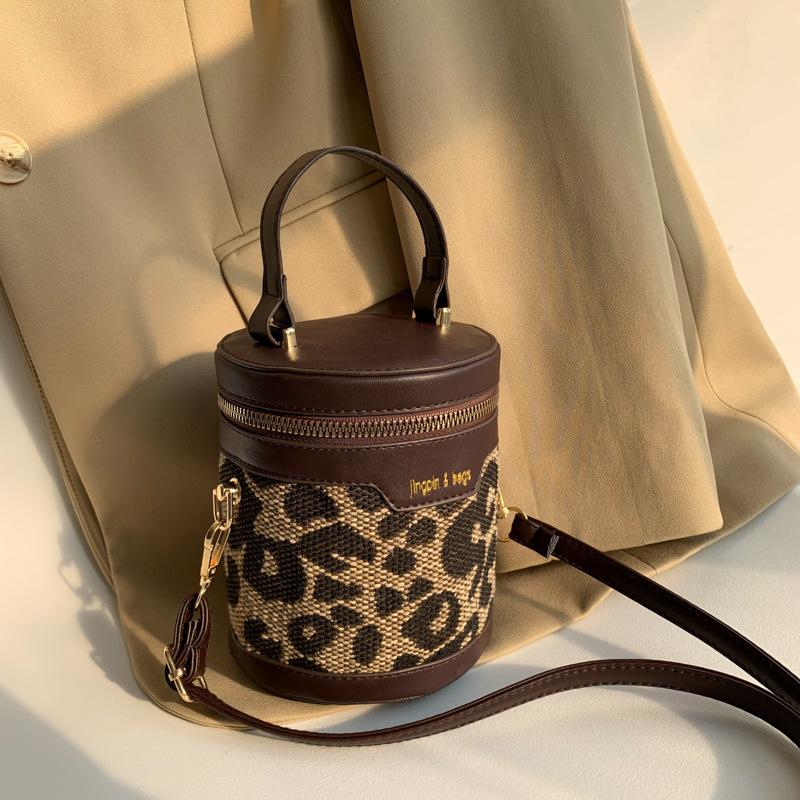 

Leopard print women s bag winter new portable bucket bag personalized trend shoulder crossbody cylinder bag