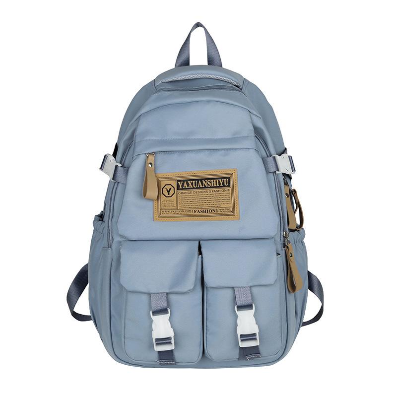 Fashionable casual large capacity multi-pocket labeling contrast color school bag for men and women students 23 autumn and winter new backpack